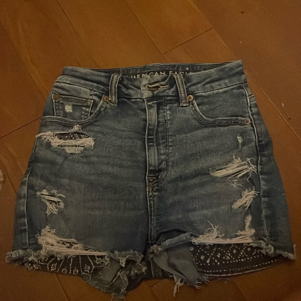 i am selling blue denim American eagle shorts